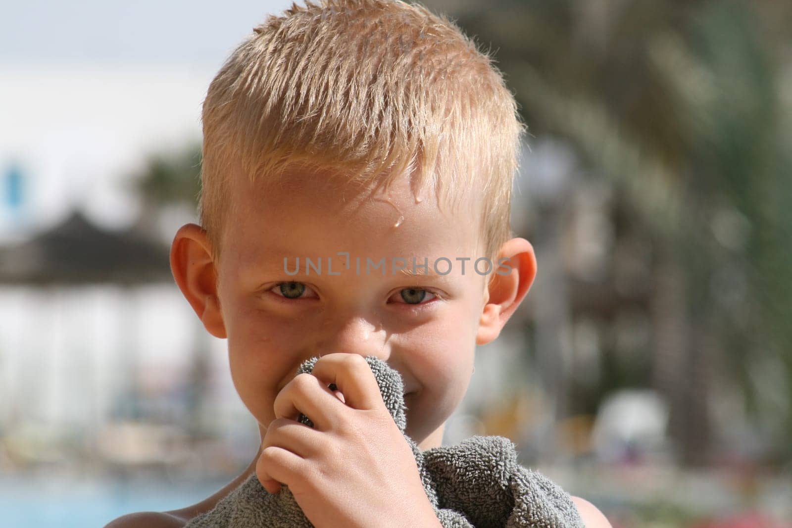 Boy drying off