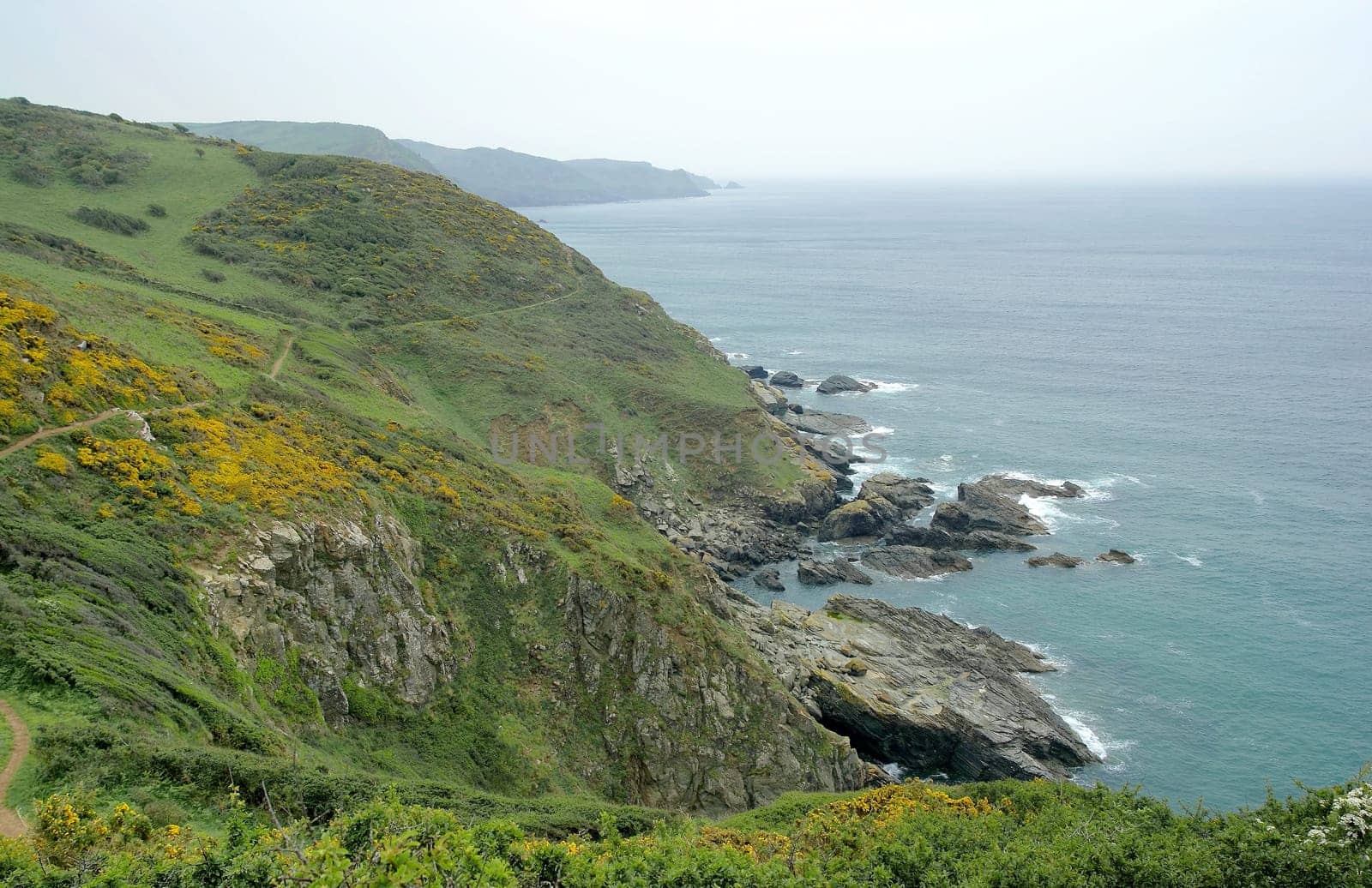 At Prawle Point,the southernmost punk on the south coast of Devon,UK. From the left you can clearly see the course of the southwest coast hiking trail.