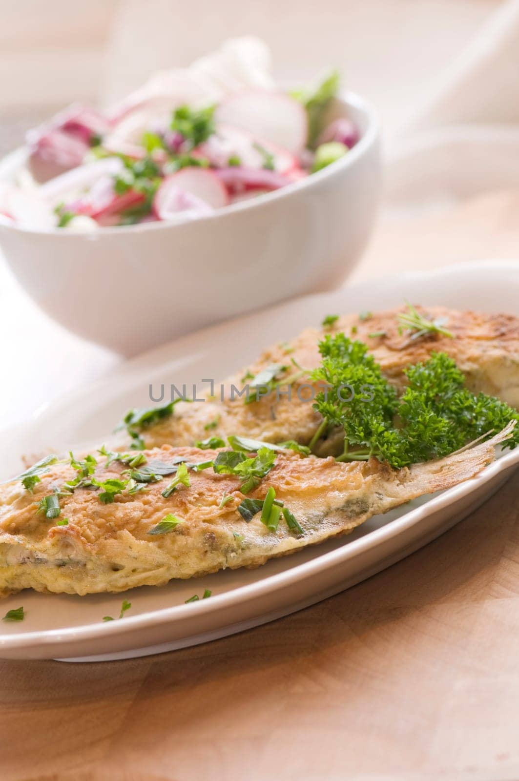 fried sardines with salad