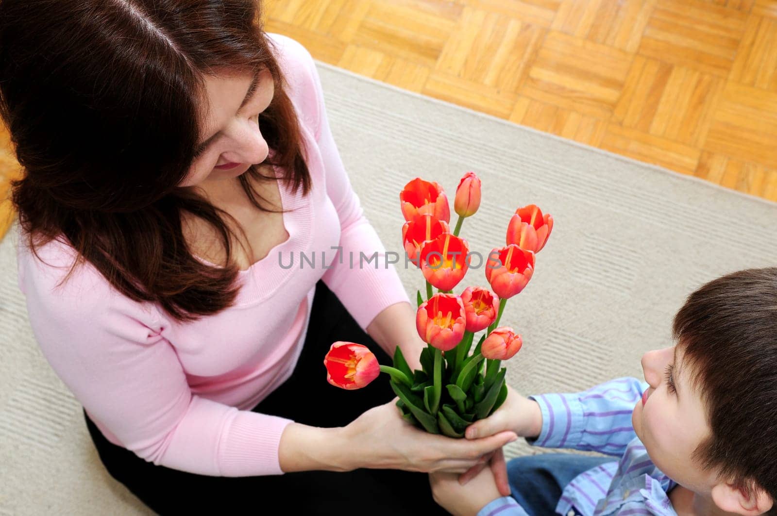 Mother and son with flowers