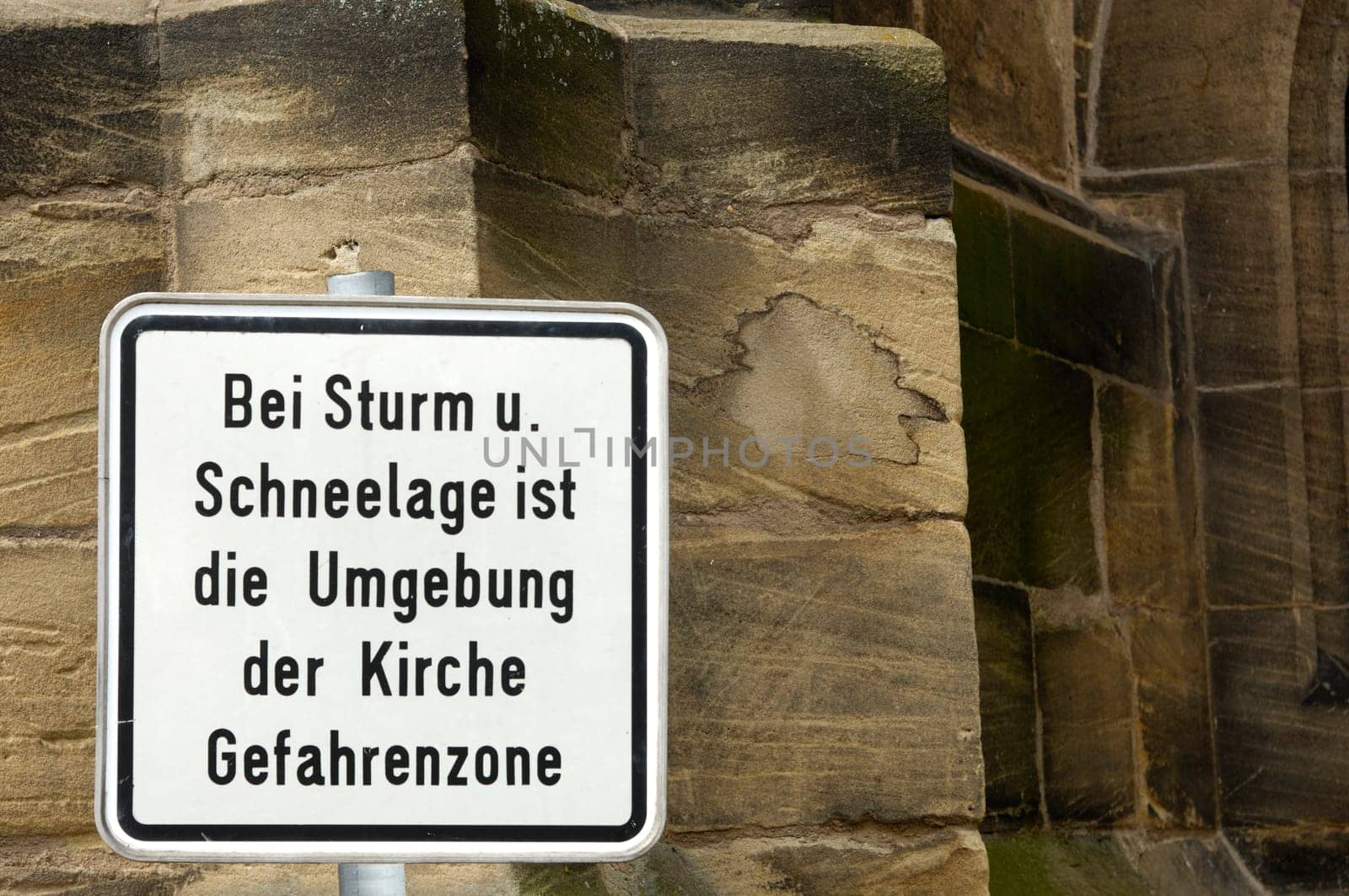 Warning sign at St. John's Church,Ansbach,Bavaria,Germany