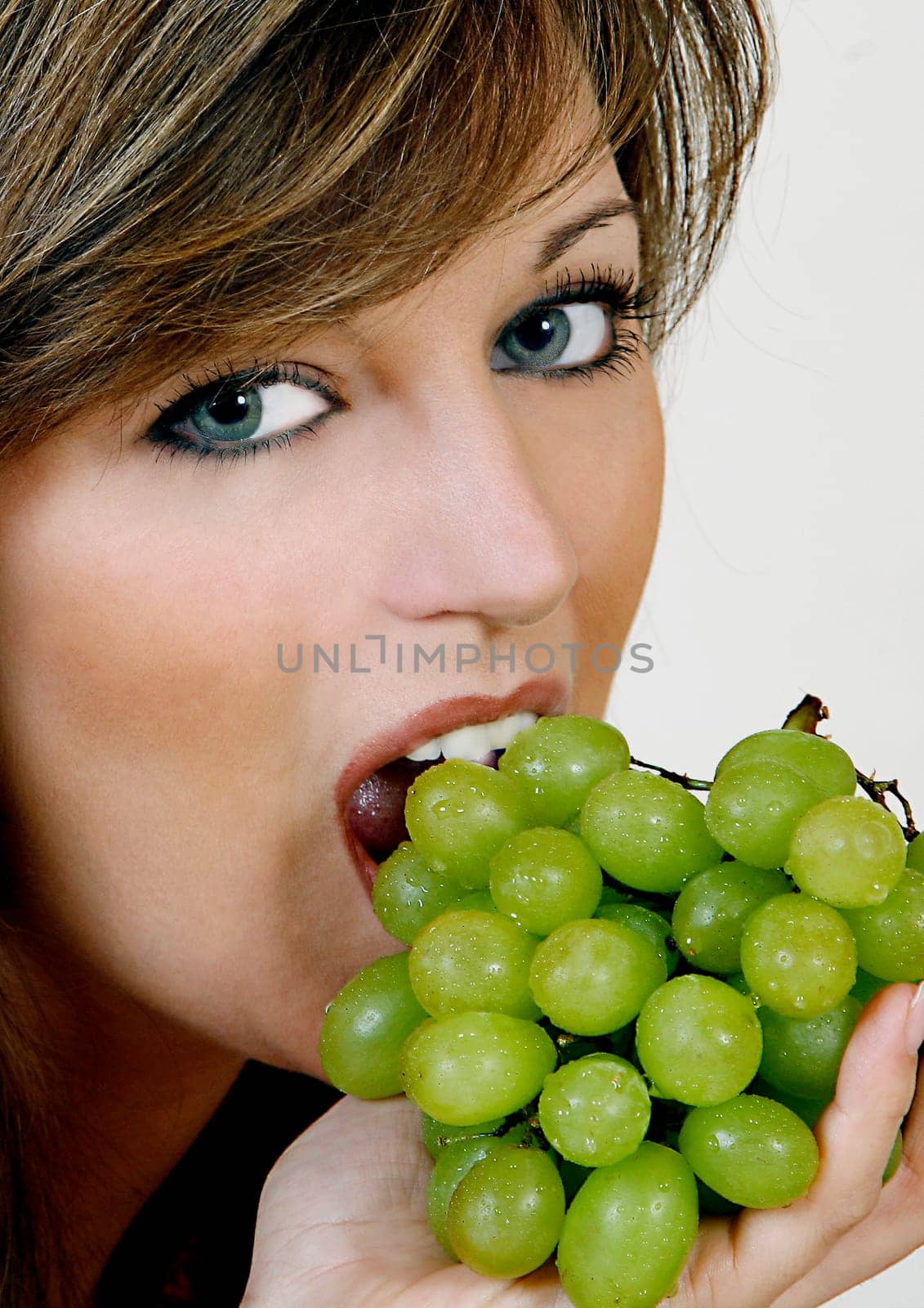 Girl with grapes