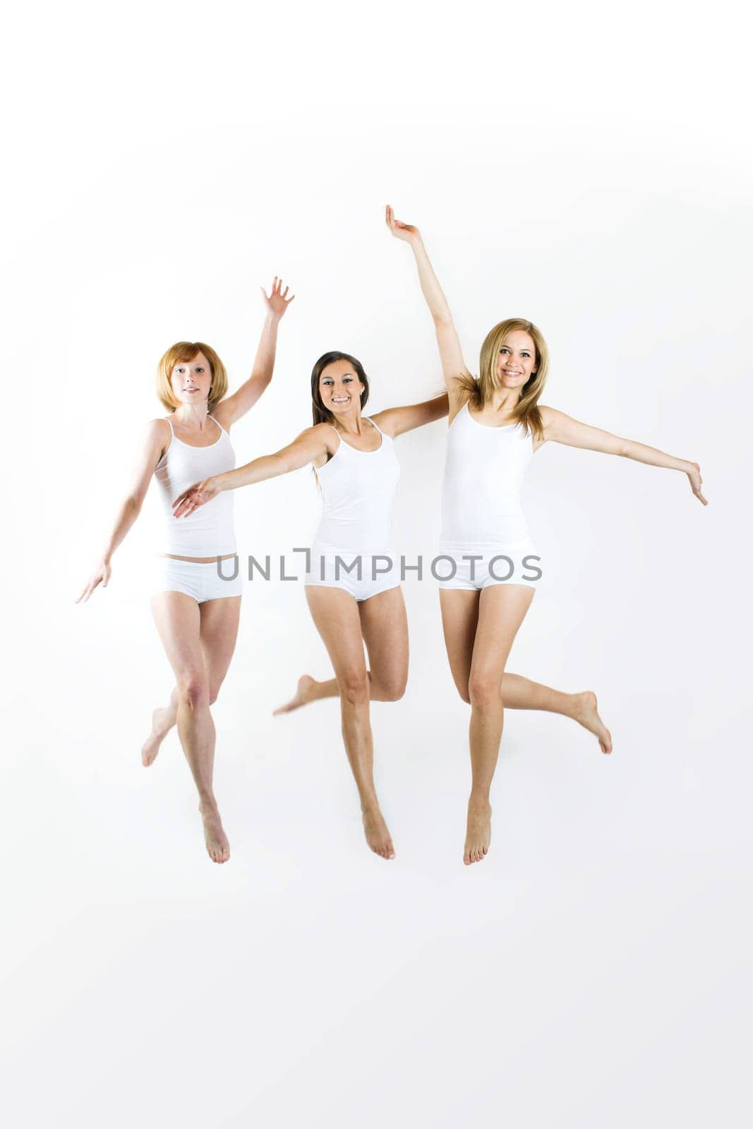 three young women in white underwear