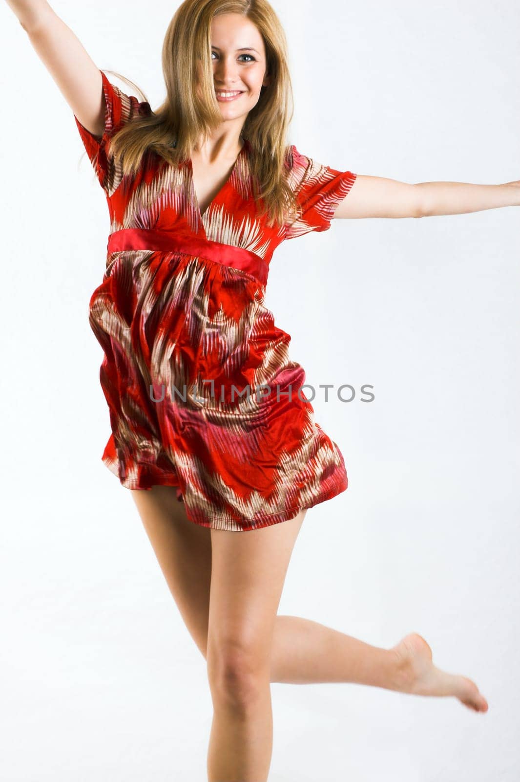 Young happy woman while jumping