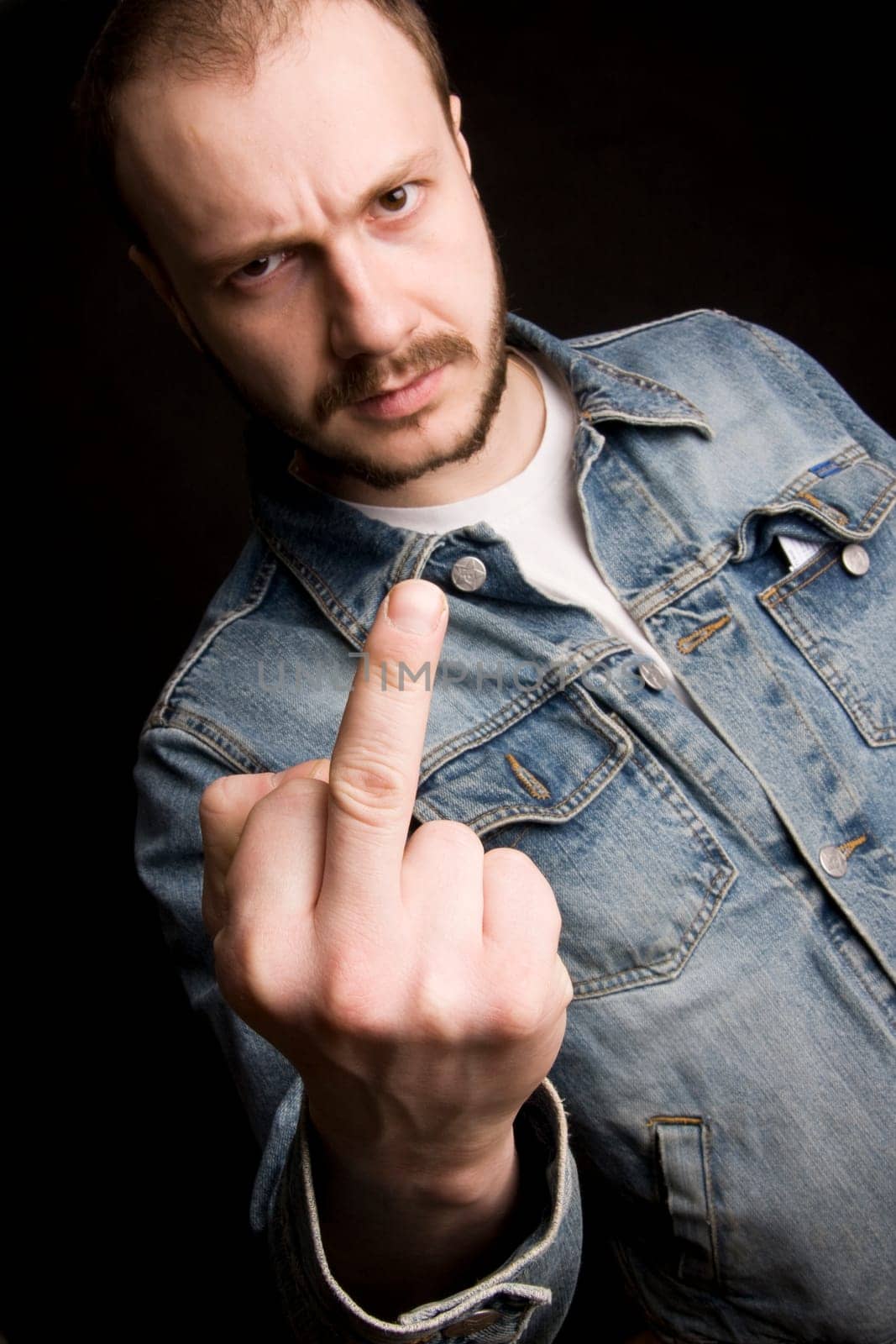 young man giving the middle finger