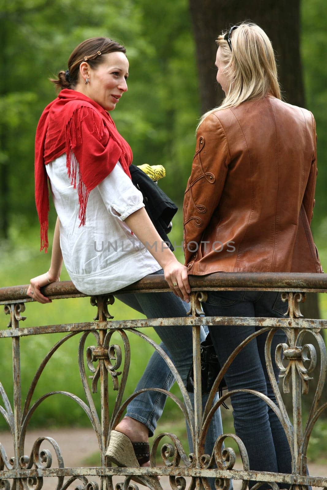 Girlfriends chatting in the park