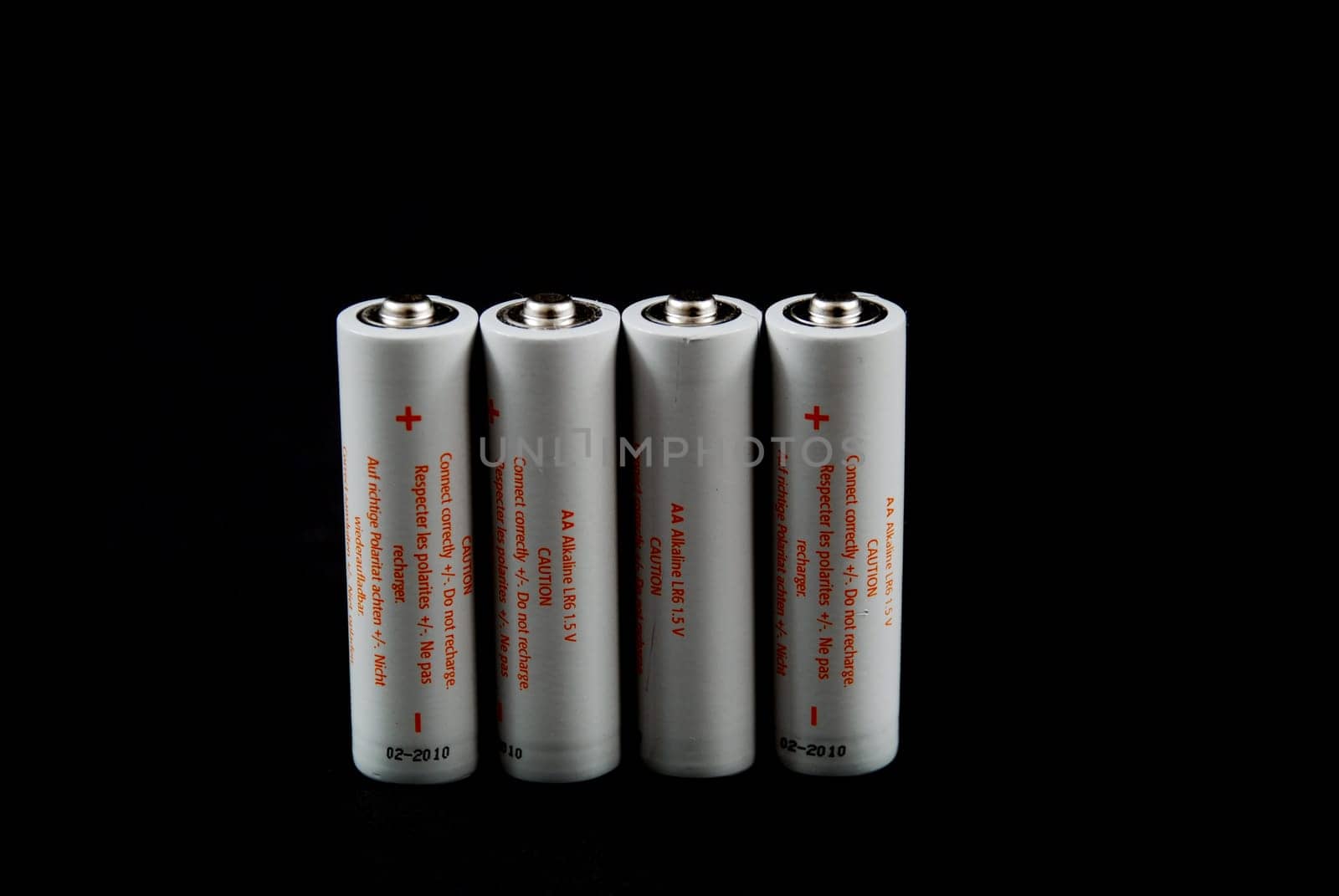 batteries on black background