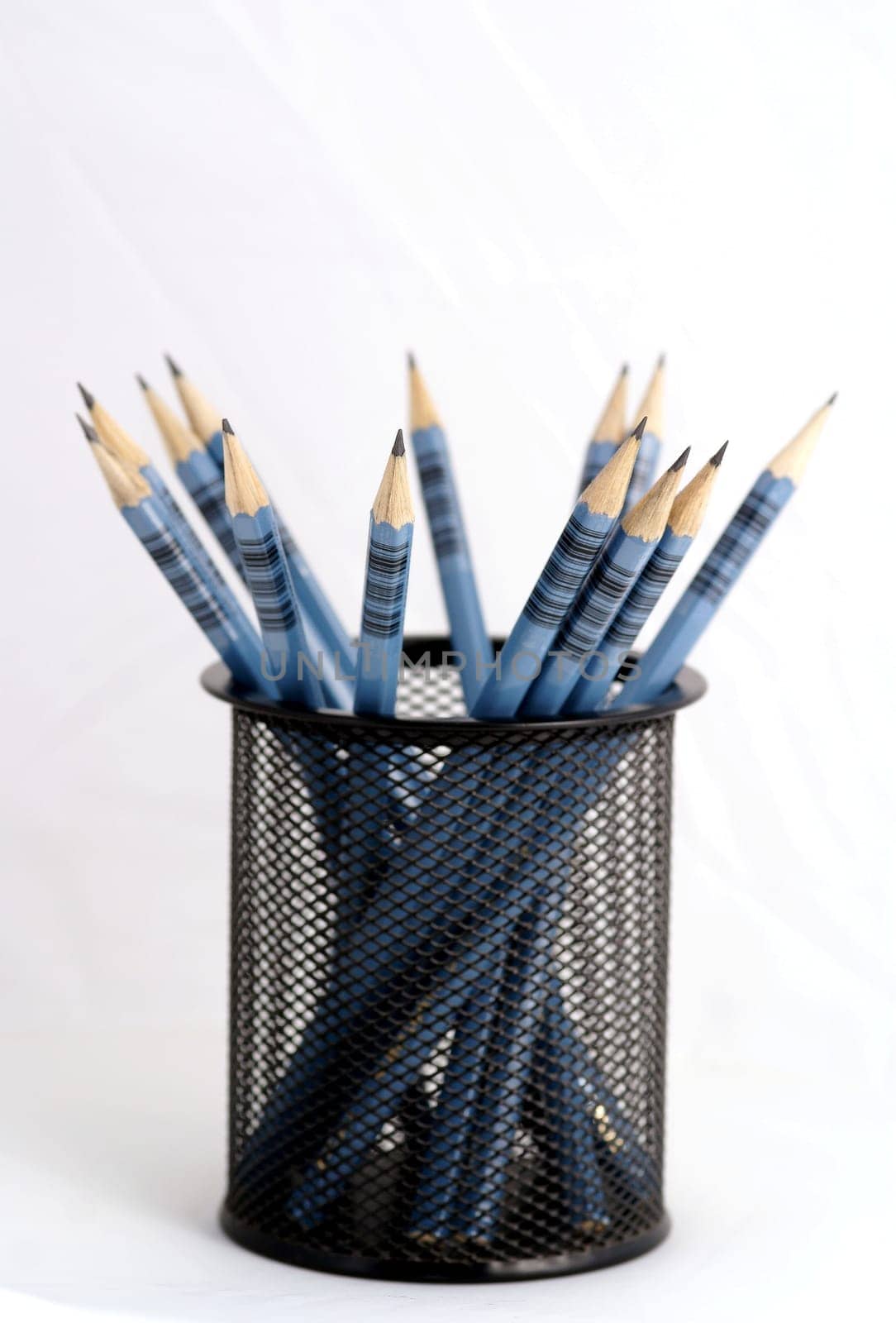 Wooden pens on pen holder