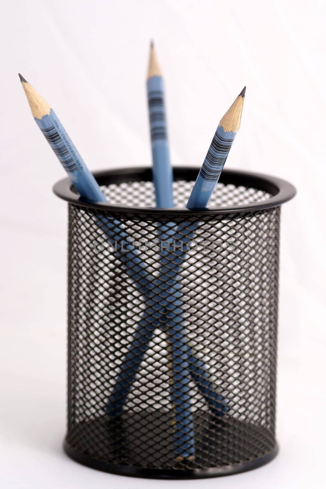 Wooden pens on pen holder
