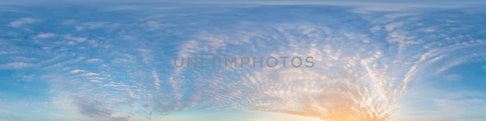 Bright sunset sky panorama with Cirrus clouds. Seamless hdr spherical equirectangular 360 panorama. Sky dome or zenith for 3D visualization, game and sky replacement for aerial drone 360 panoramas.