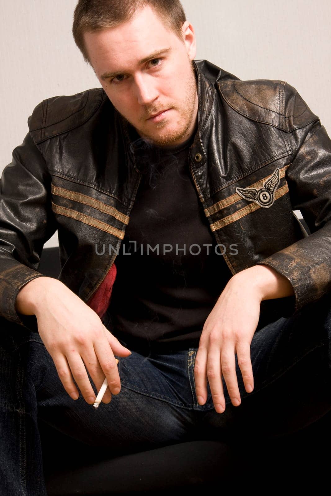 man smoking a cigarette