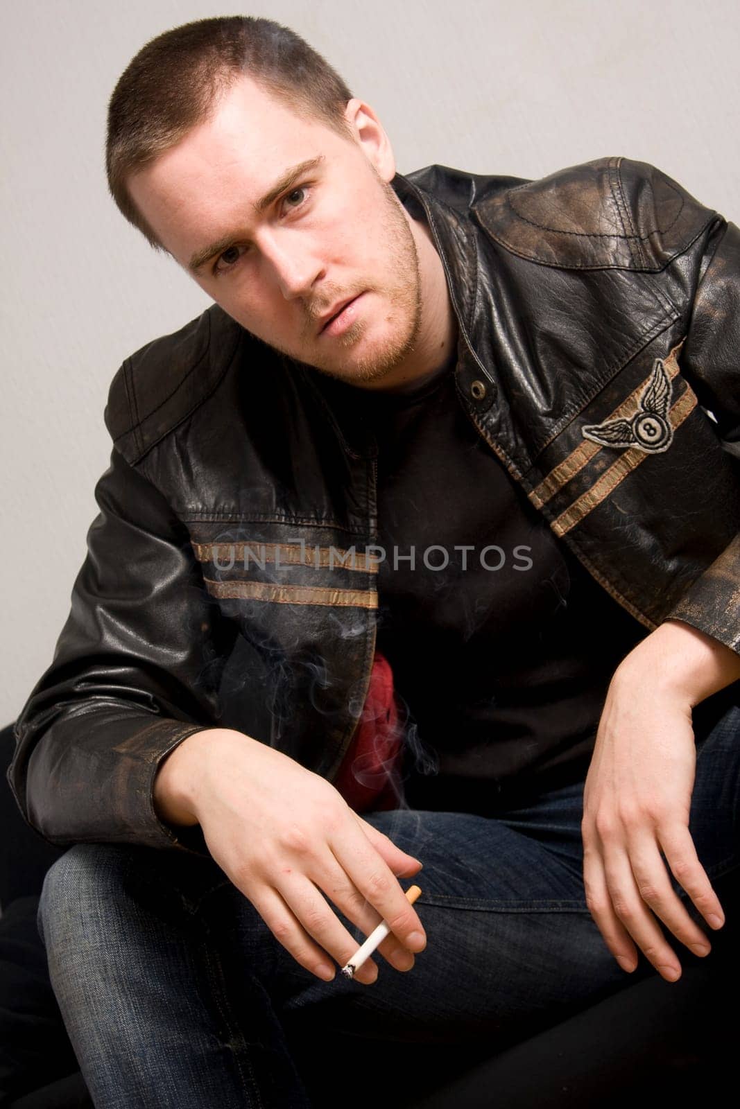 man smoking a cigarette