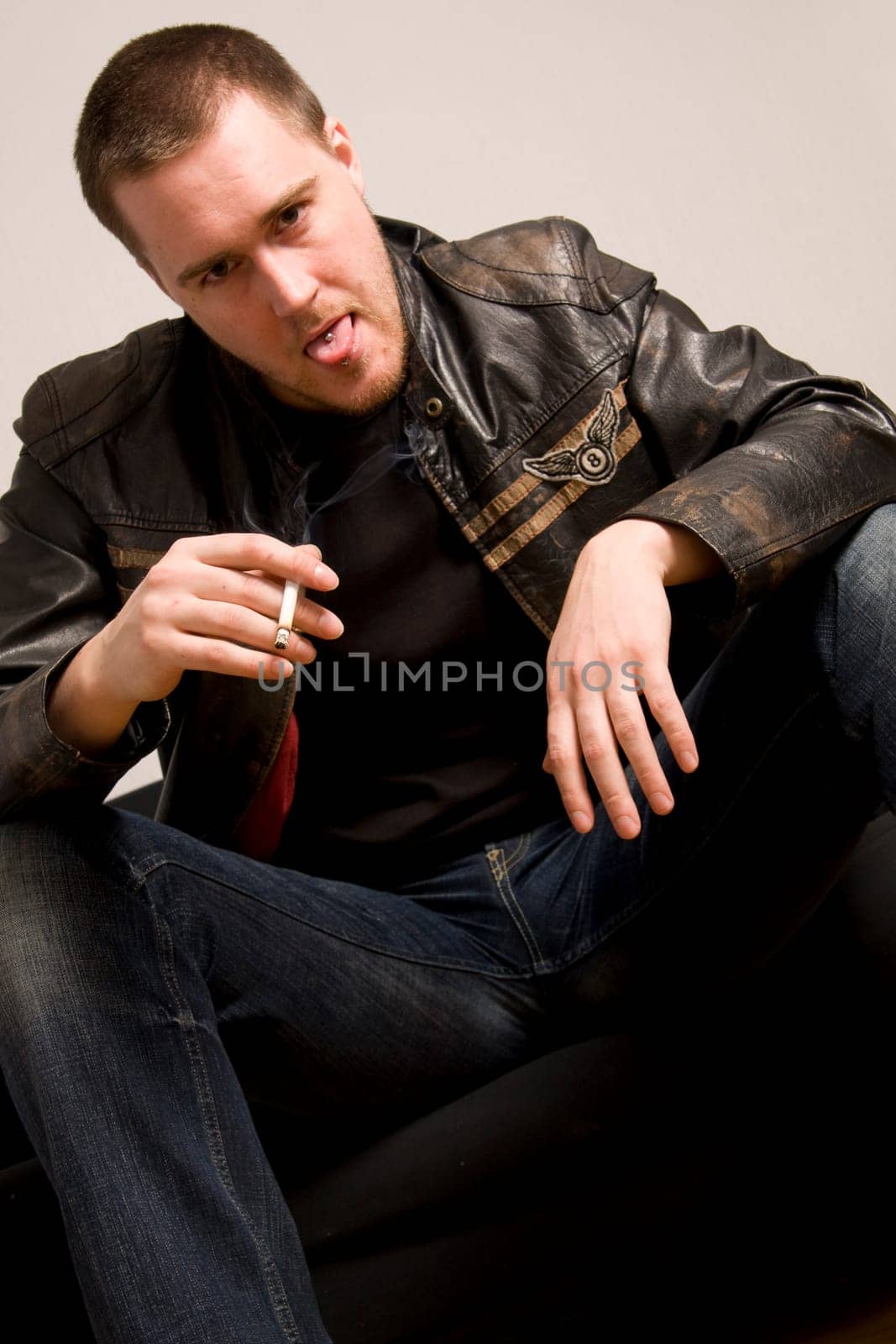 man smoking a cigarette