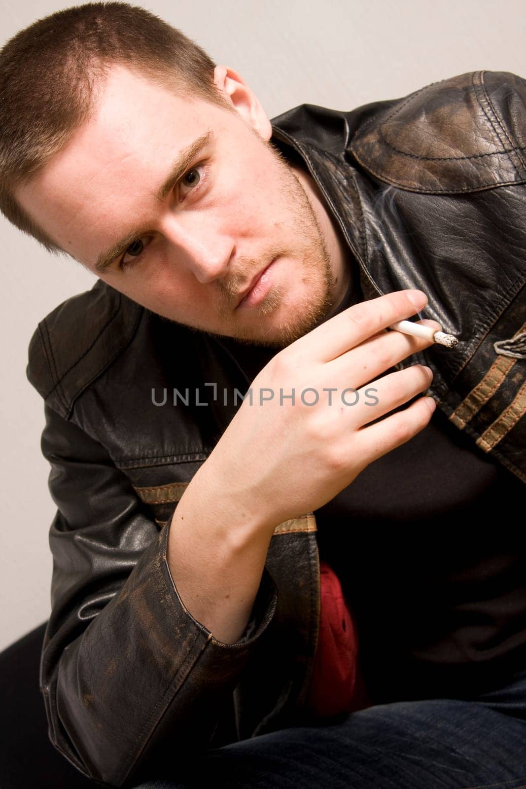 man smoking a cigarette