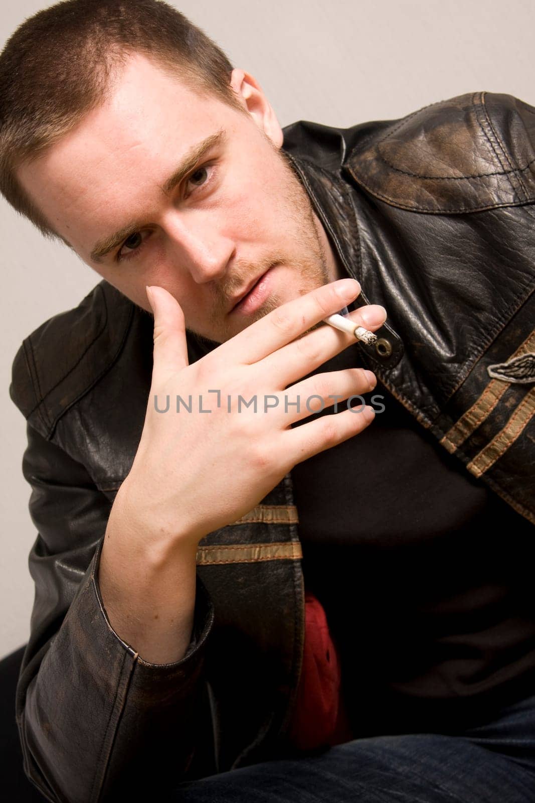 man smoking a cigarette