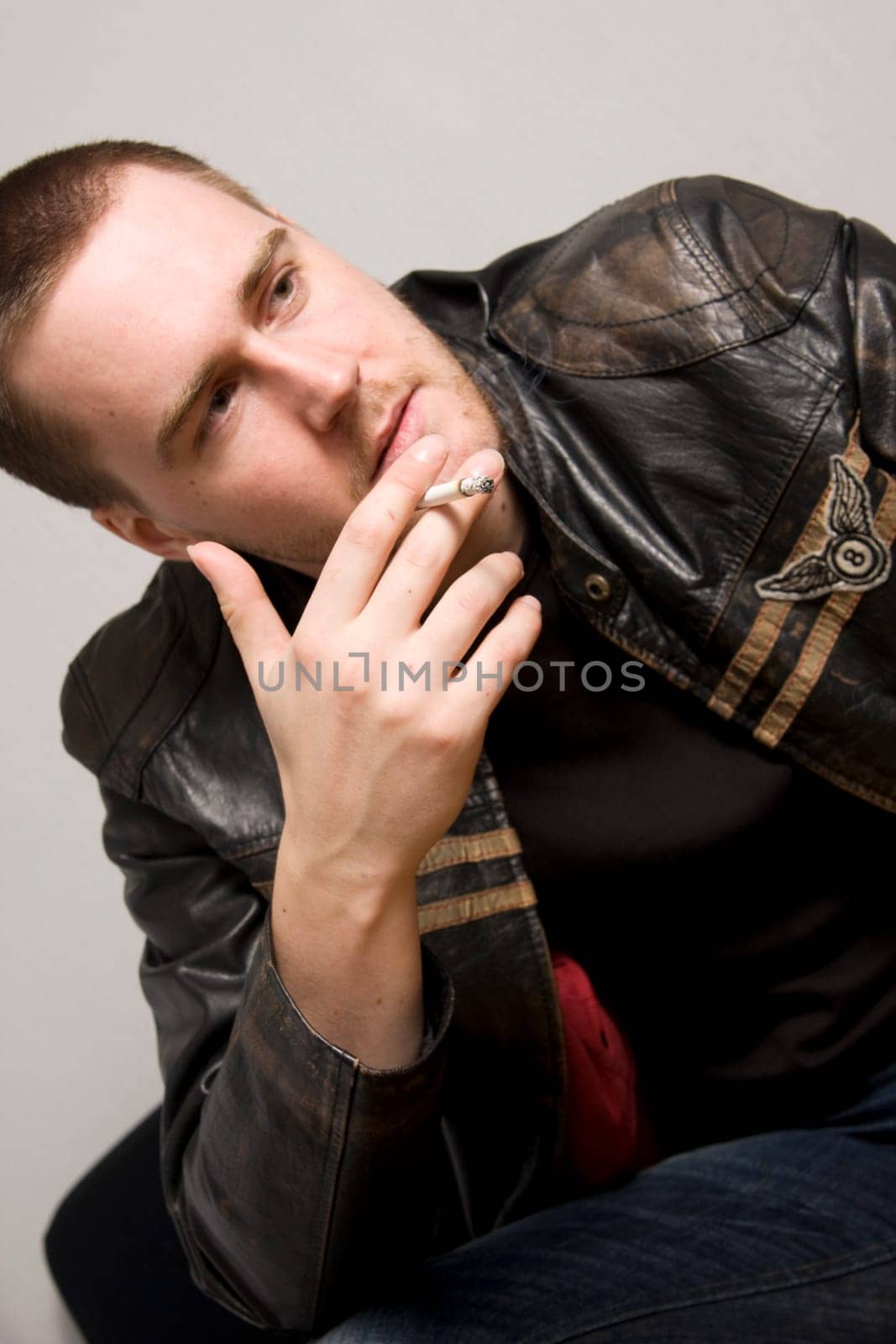 man smoking a cigarette