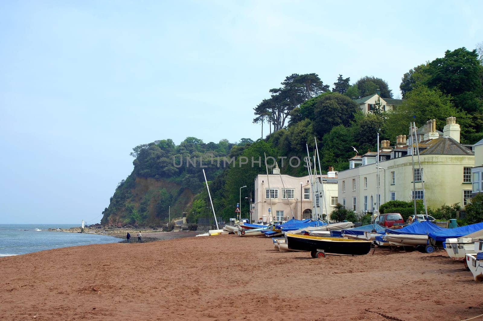On the red sandy beach of Shaldon on the River Teign opposite Teignmouth on the south coast of Devon,south-west England