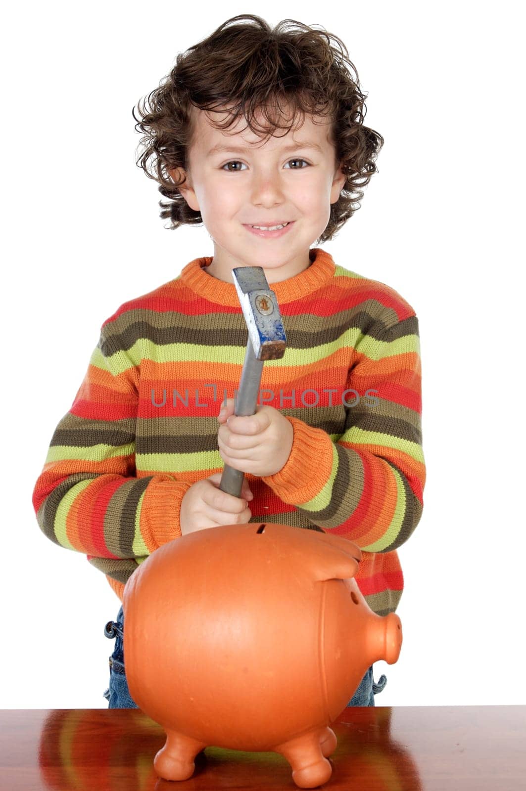 adorable boy breaking the money box