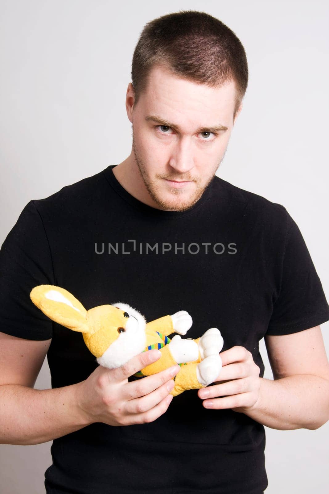 man holding a bunny