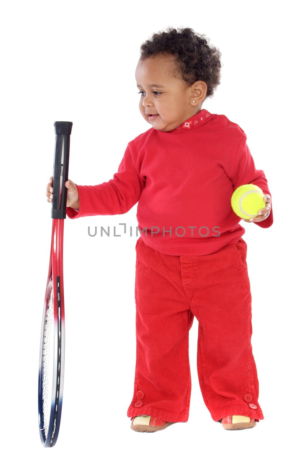 little girl with racket and tennis ball