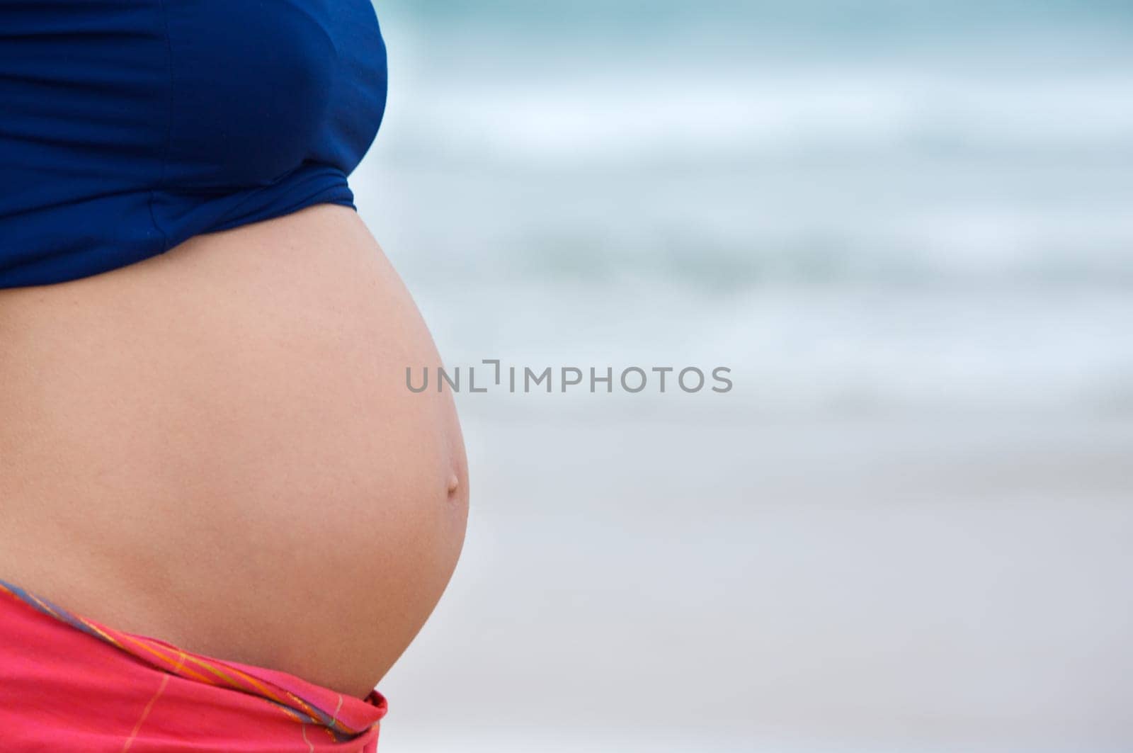 Pregnant with sea background