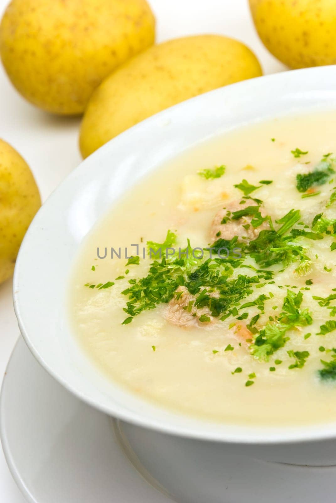 Potato cream soup with meatballs
