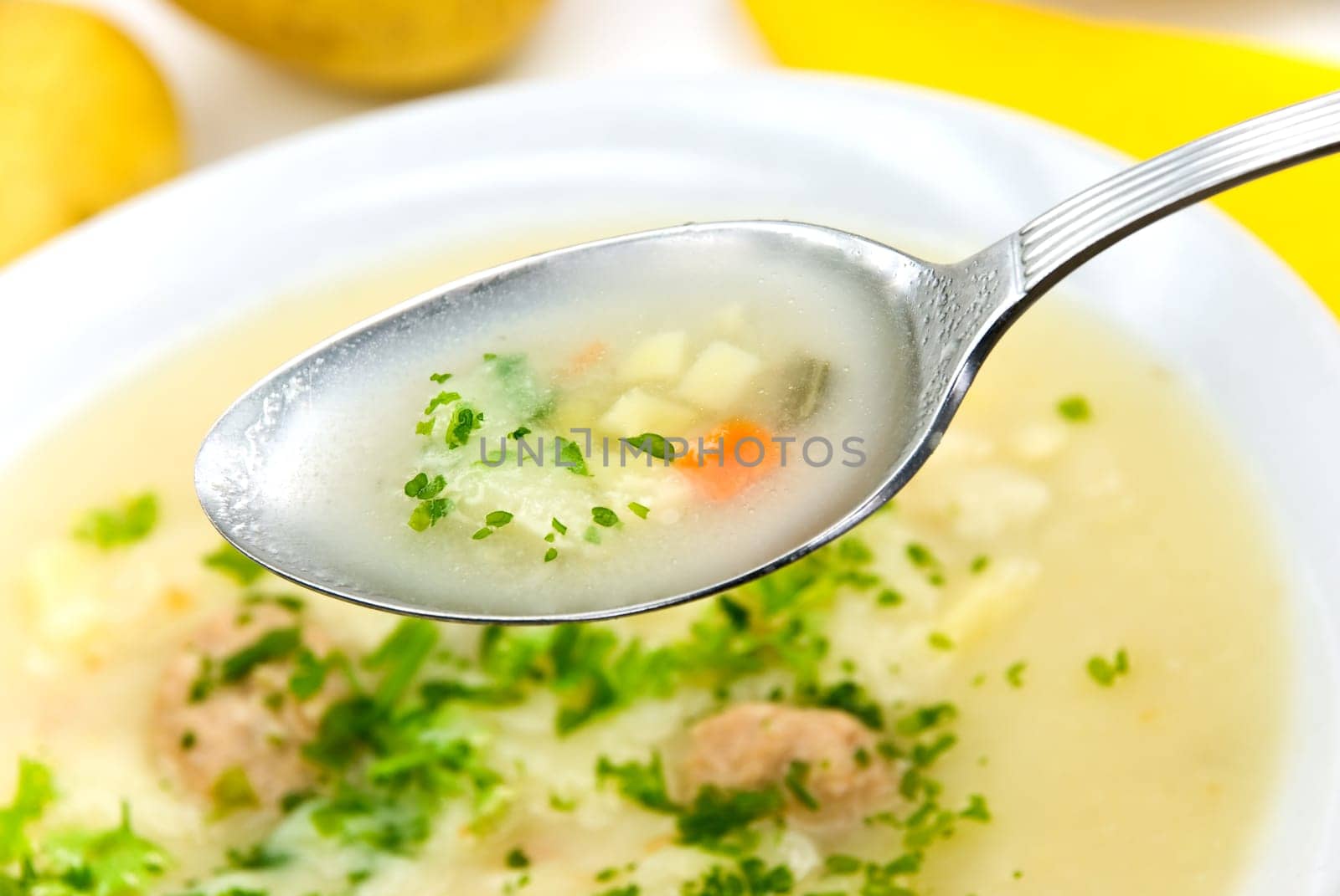 Potato cream soup with meatballs