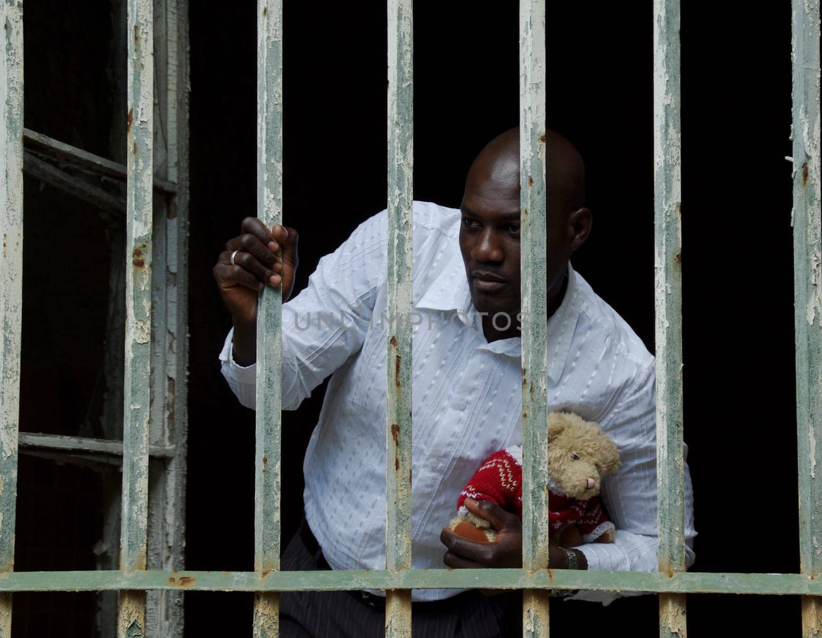 Sad look - man with teddy bear