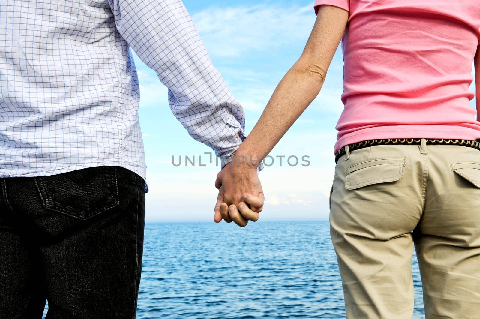 Couple holding hands