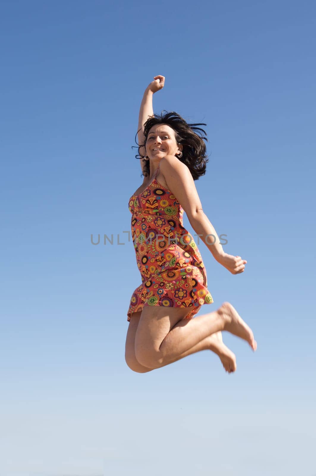 Beautiful girl jumping