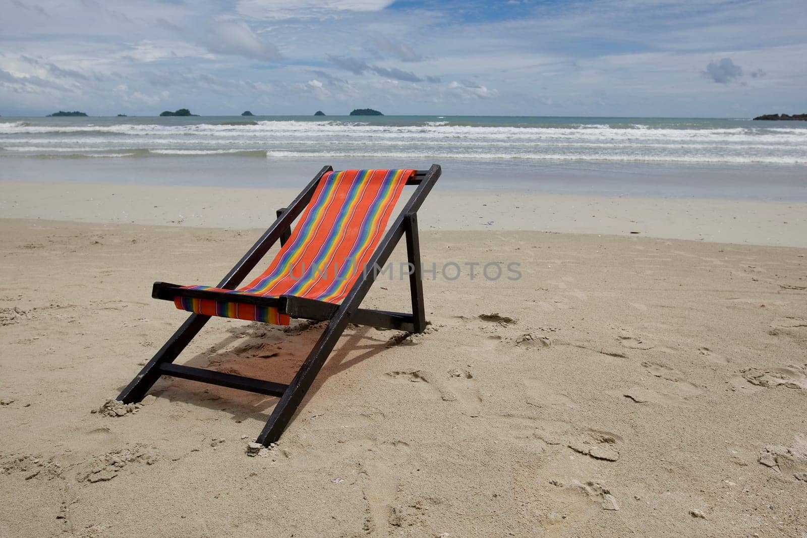 Sun lounger on the sandy beach