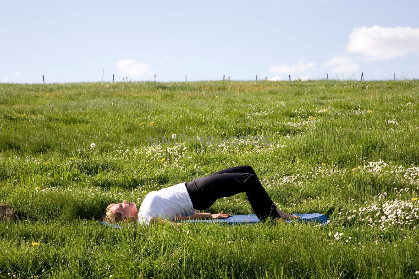 Woman doing bridging exercises