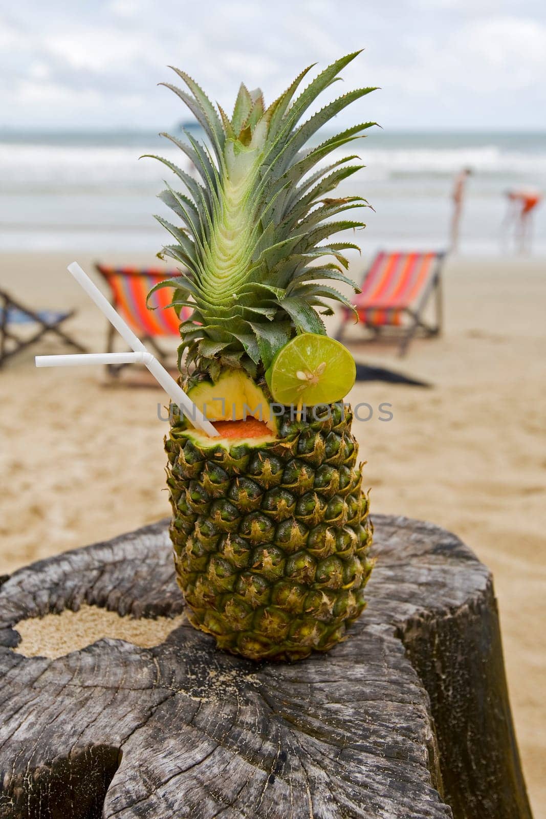 Pineapple,cocktail on the beach