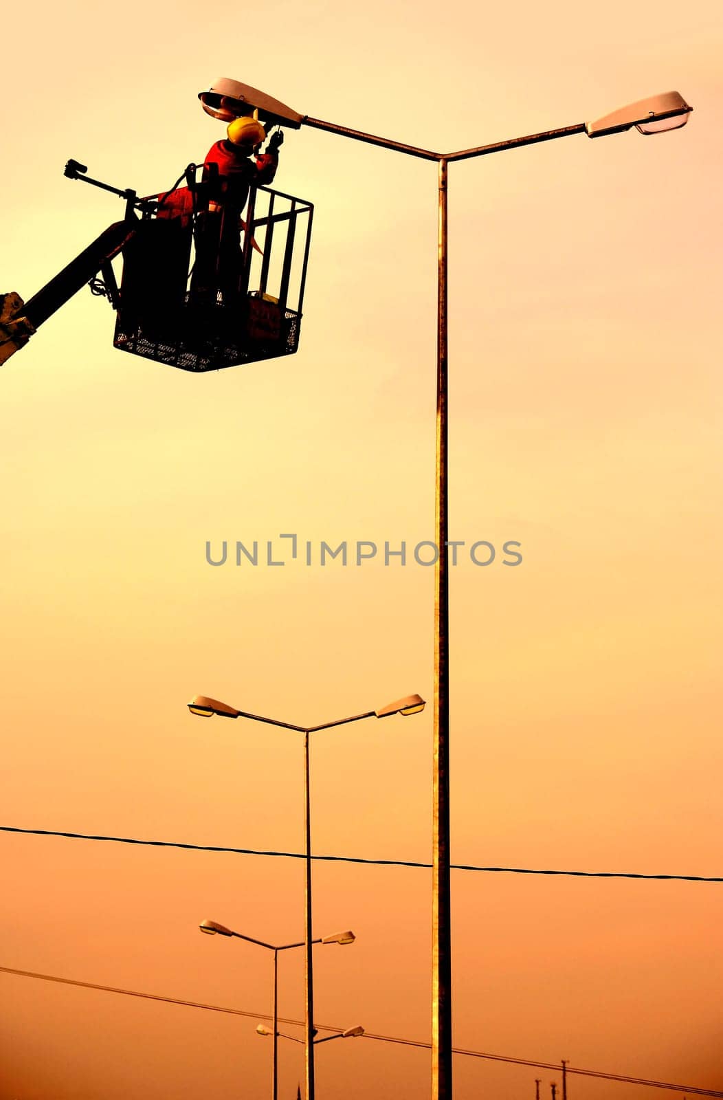 An electrical power utility worker