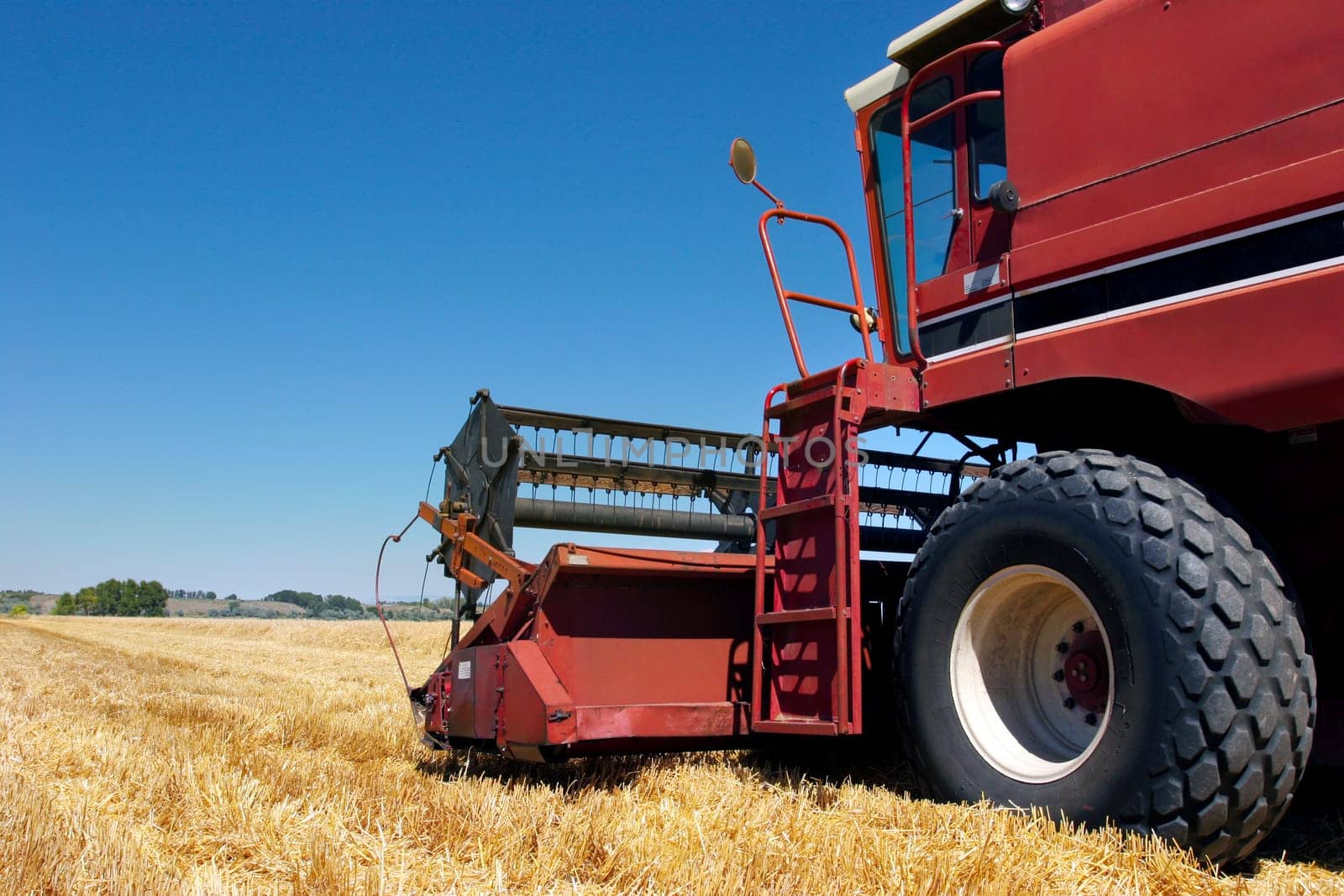combine harvester on field