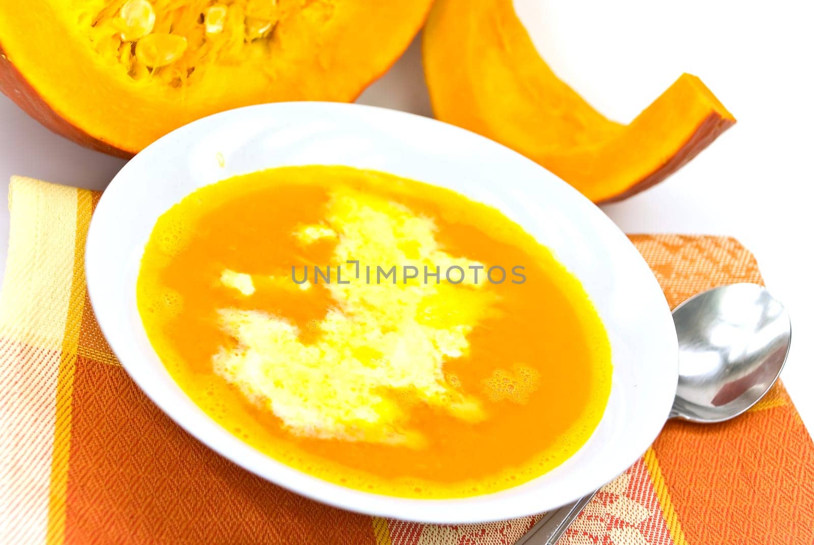 Pumpkin soup with whipped cream