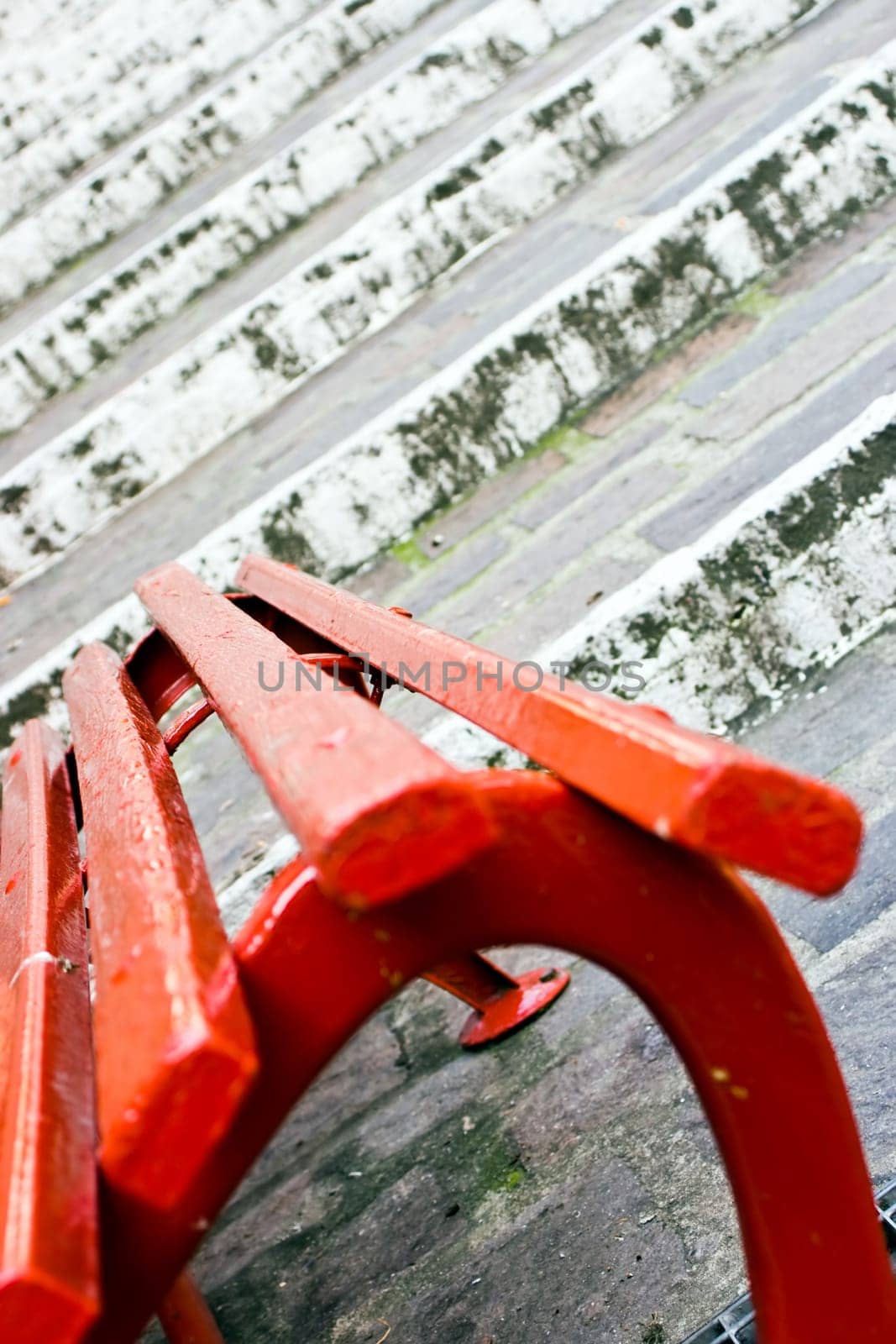 Red Seat And White Stairs