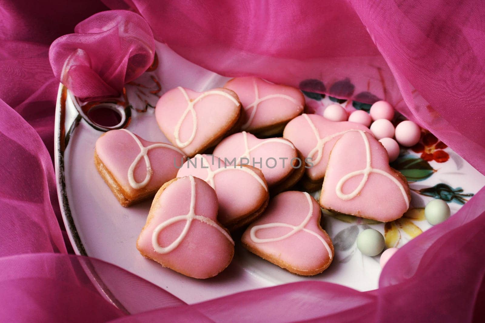 Heart-shaped cookies on plate