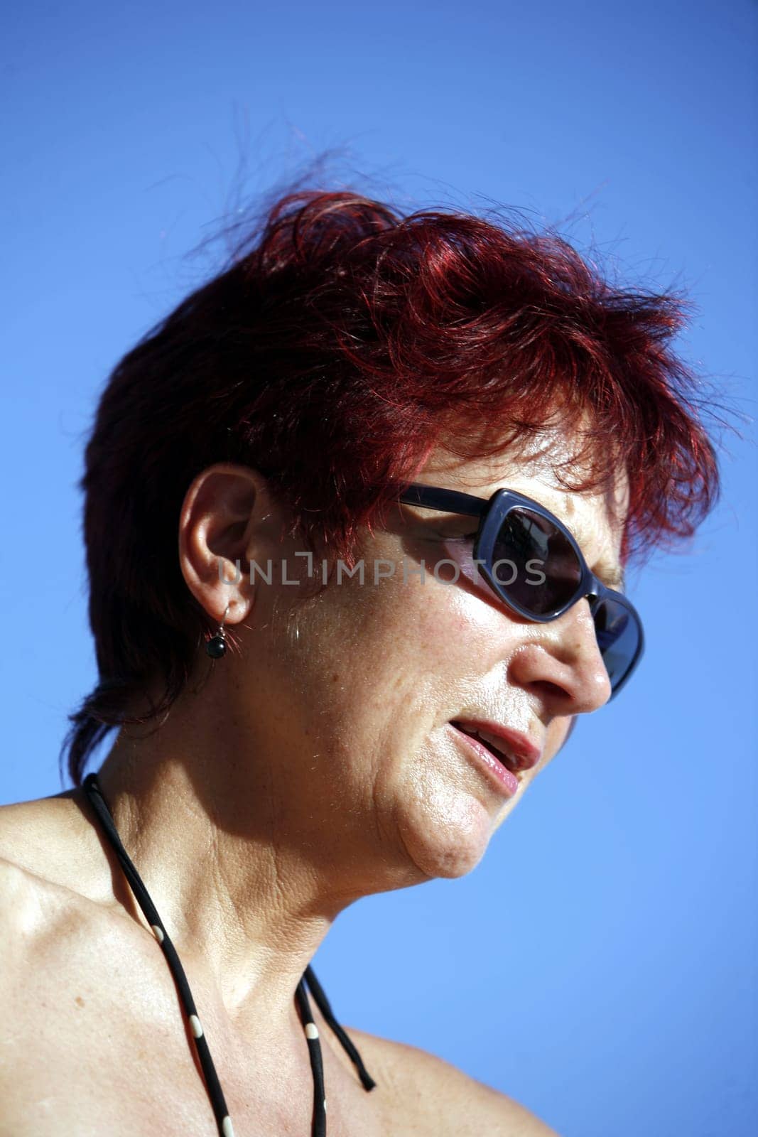 redhead woman mid 50's