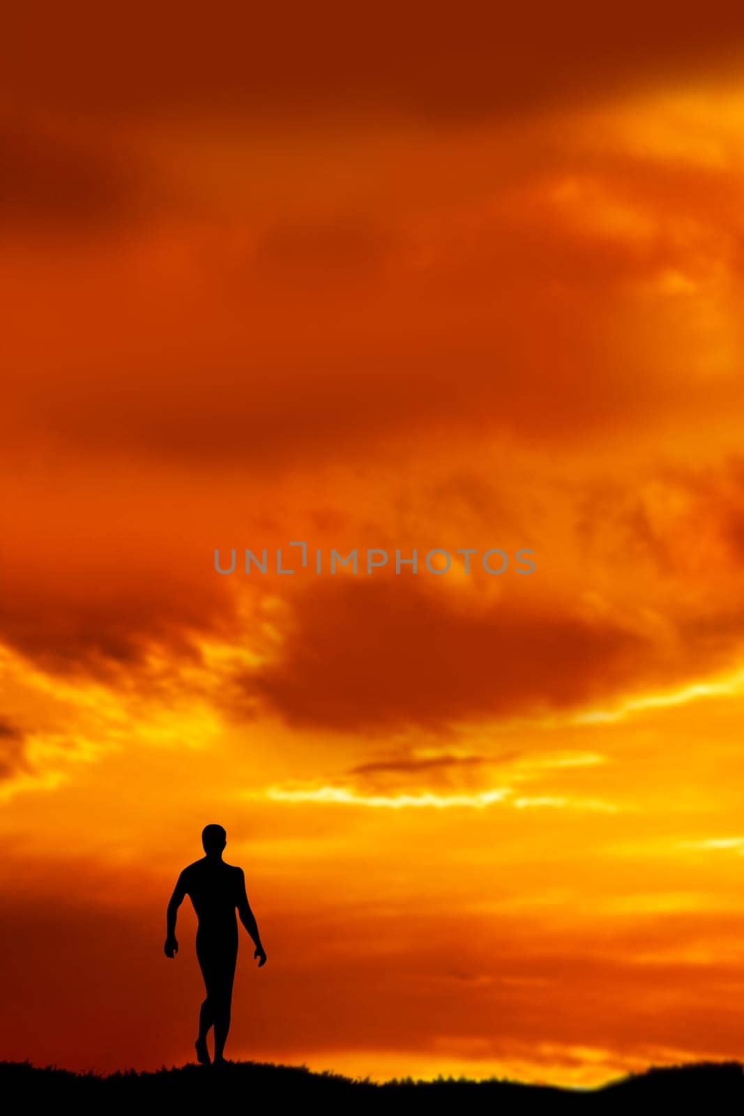 Man silhouetted by sunset