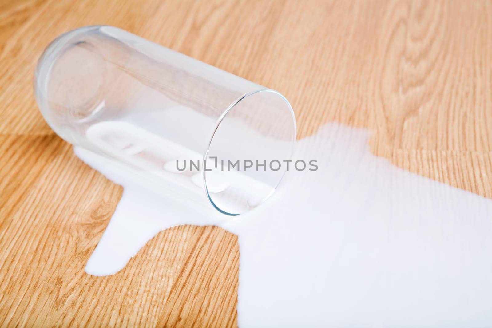milk spilled from glass