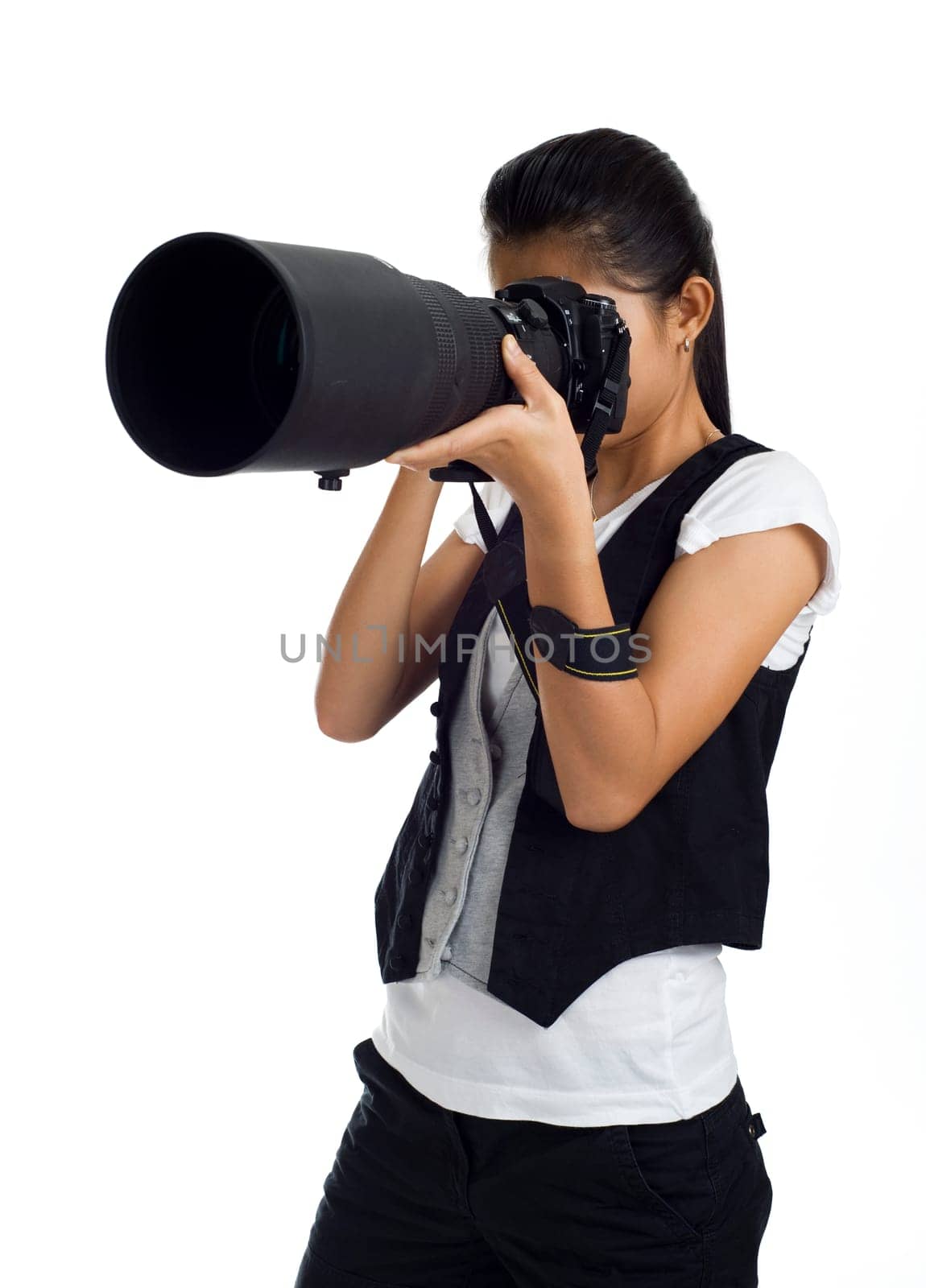 Young asian woman with camera and telephoto