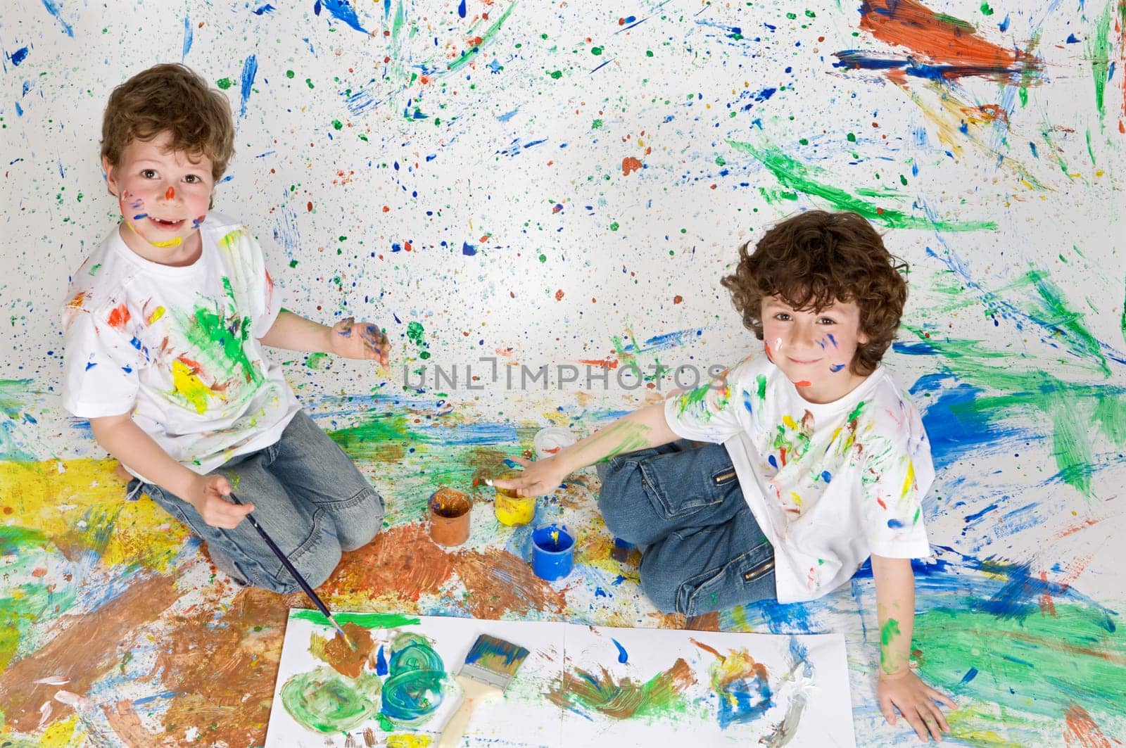 Children playing with painting