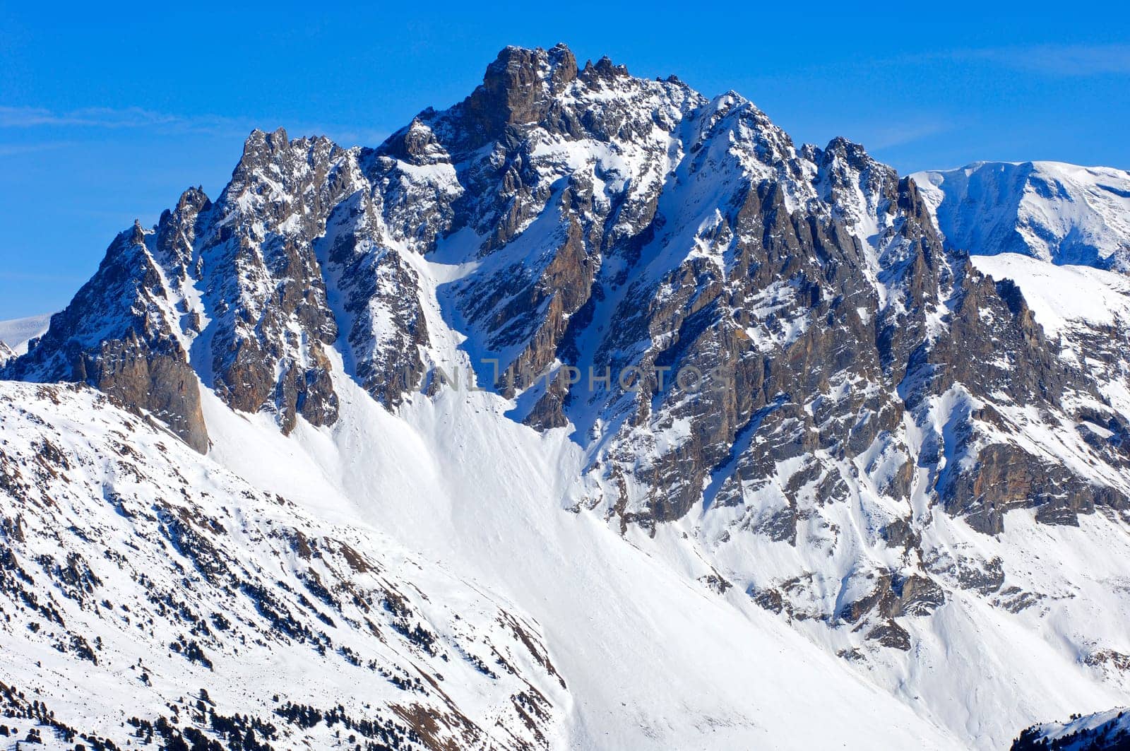 Majestic Alpine peak in winter