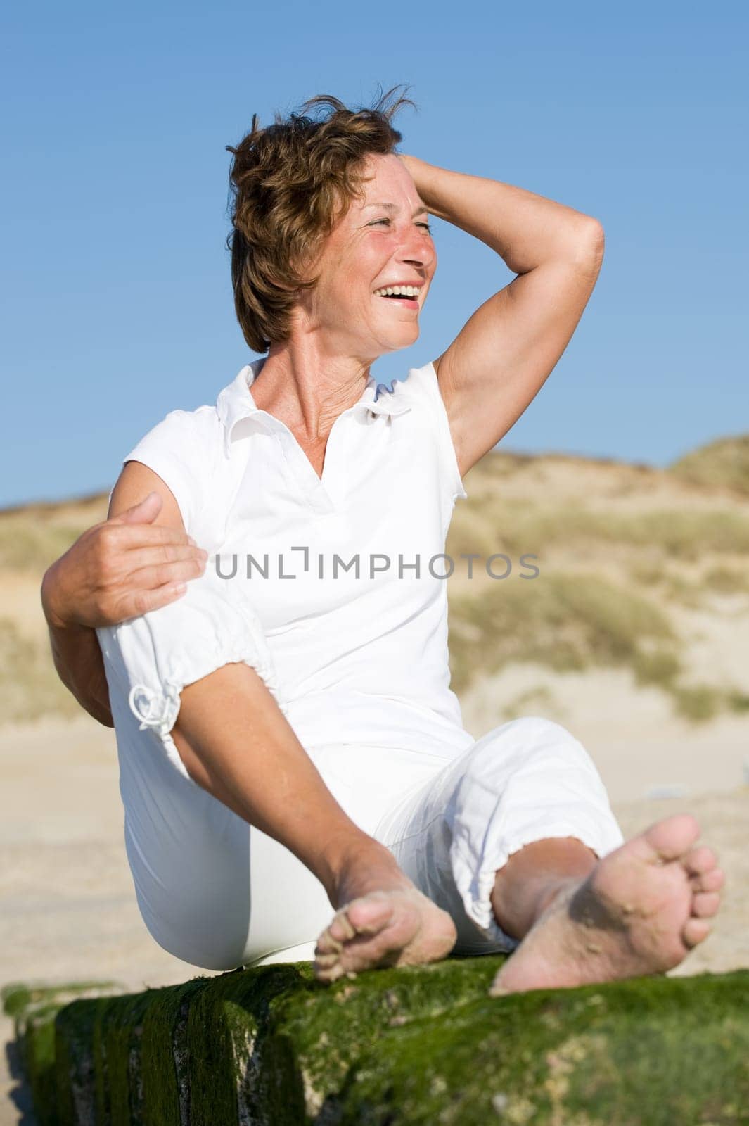 Senior woman on the beach