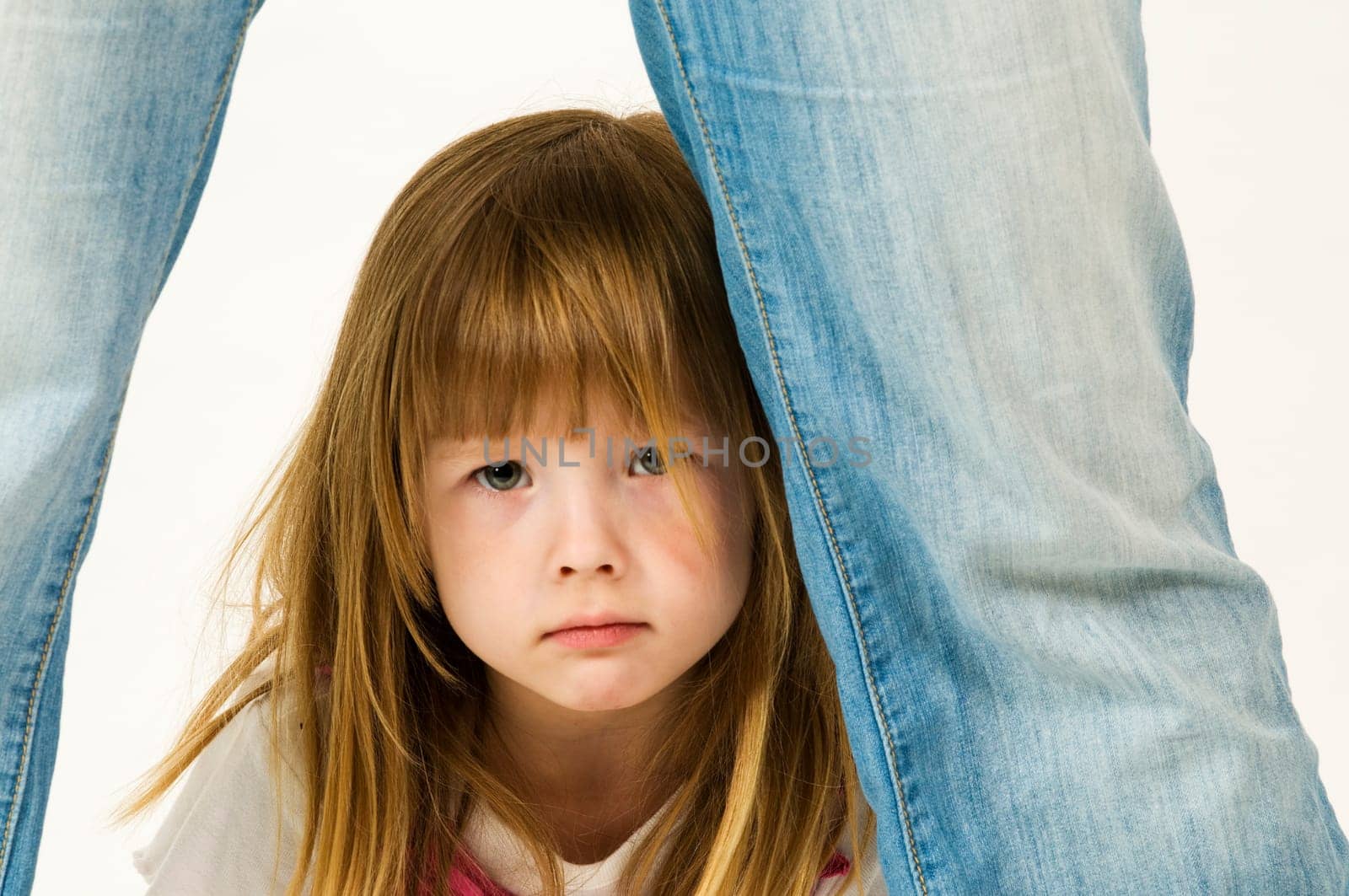 little girl between legs