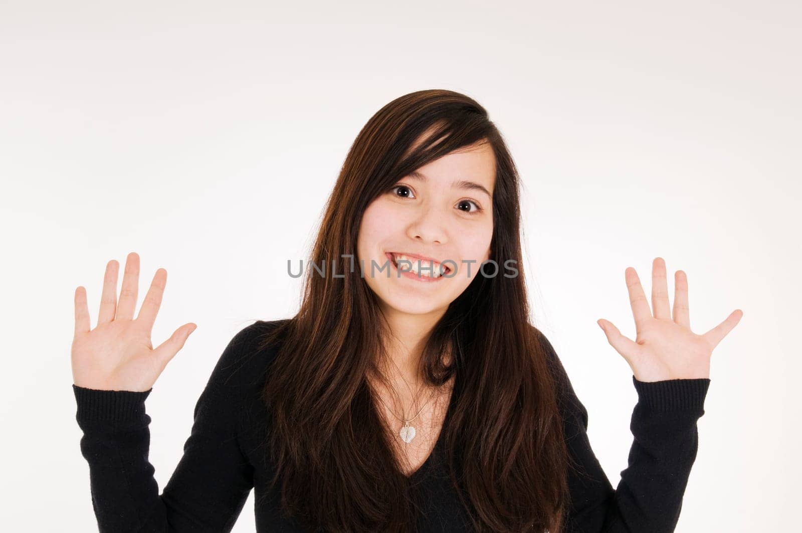smiling girl hands up