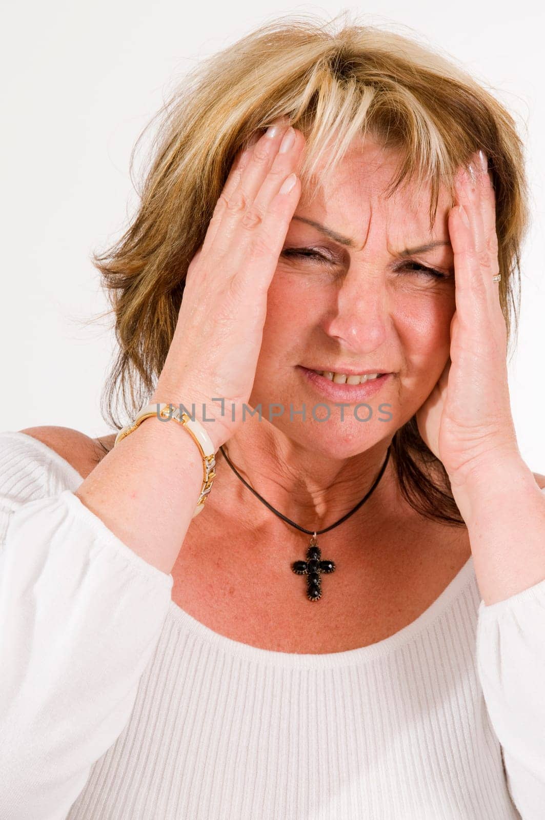 woman gesturing headache