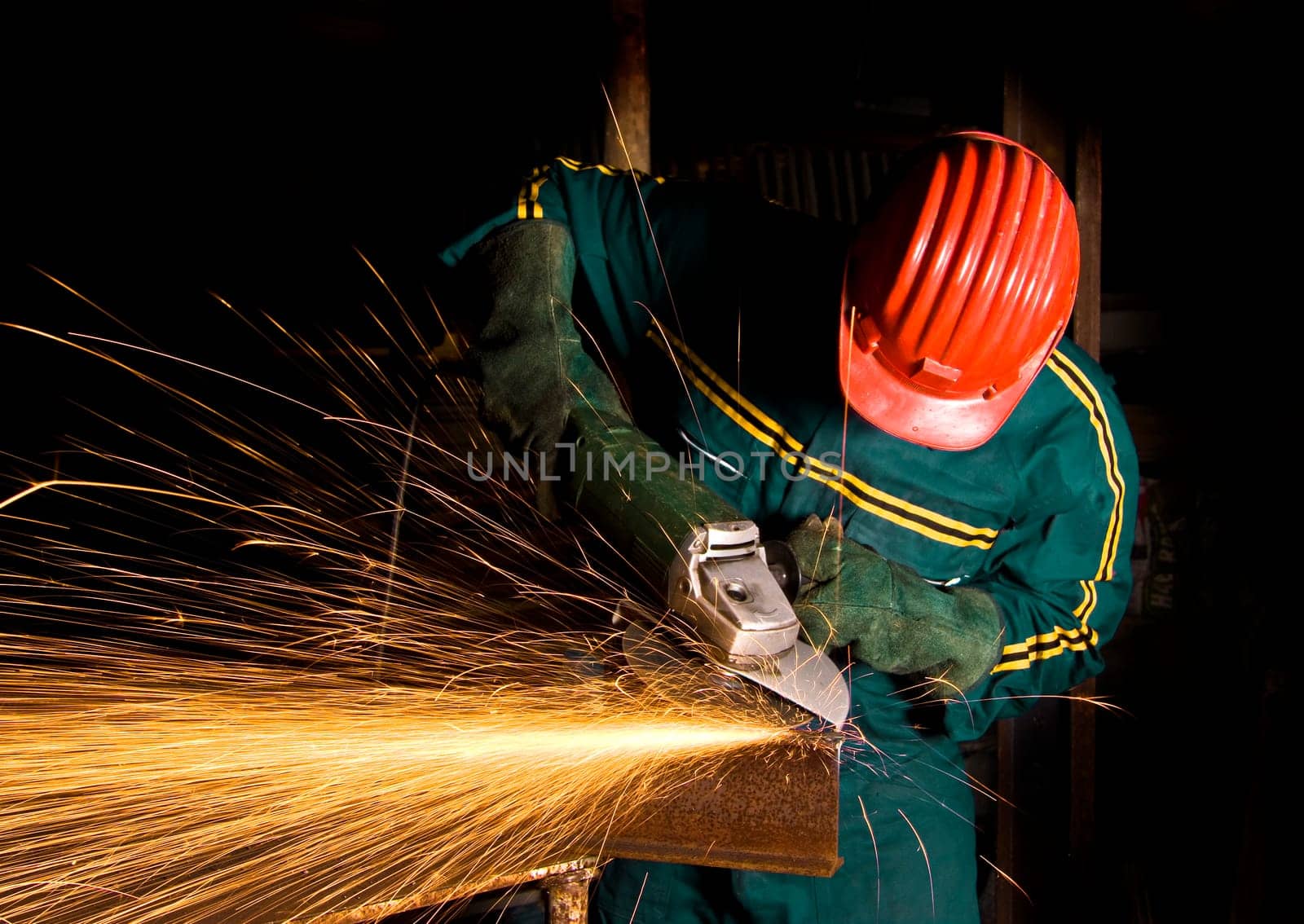 manual worker with grinder