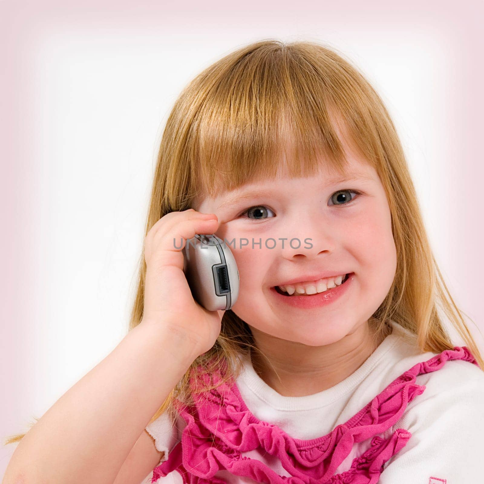 little girl make a phone call